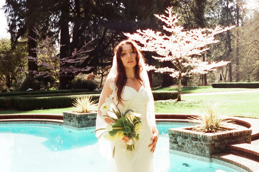 Carly photographed on CineStill 400D near the Lakewold Gardens pool