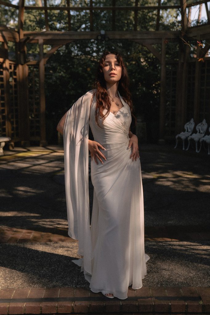 Bride posing in front of the Tea House Gazebo for her Lakewold Gardens wedding photos in Lakewood, Washington.