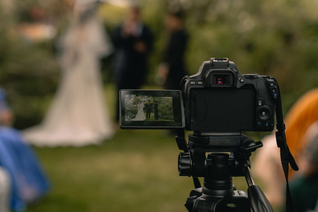 Video recording the ceremony.