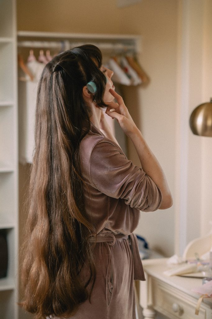 Bride getting ready for her Seattle micro wedding at an Airbnb.
