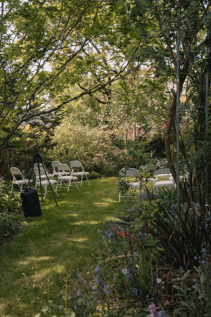 Intimate backyard Seattle micro wedding ceremony setup.